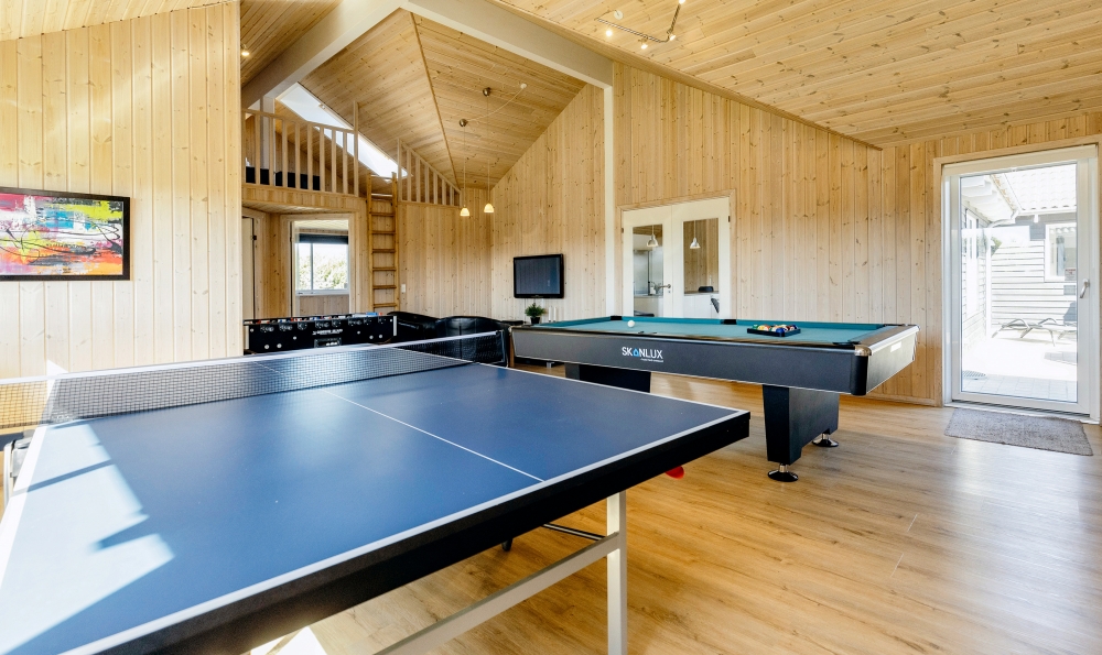 Ud over de mange timer, man kan bruge i husets pool-afdeling, så byder luksushus 267 også på billard/bordtennis og dart