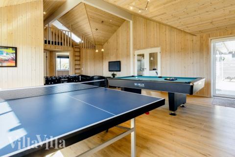 Ud over de mange timer, man kan bruge i husets pool-afdeling, så byder luksushus 267 også på billard/bordtennis og dart
