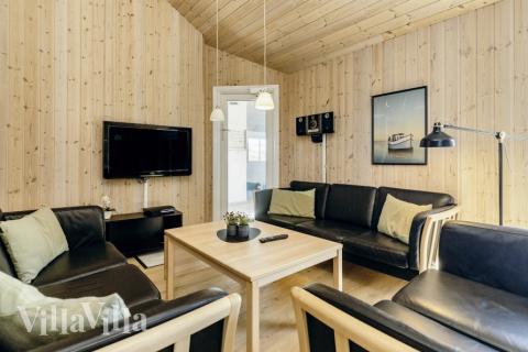 Sofahjørnet i luksushus 267 i Nordjylland.