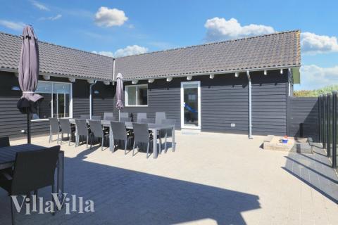 Nyd en grillaften på terrassen i luksushus nr. 267 i Nordjylland