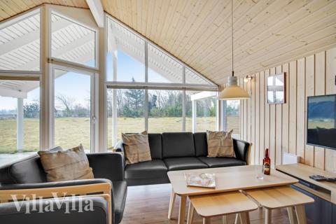 Sofahjørnet i luksushus 236 i Nordjylland.