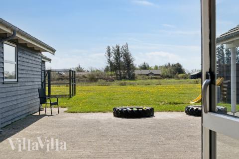 Nyd en grillaften på terrassen i luksushus nr. 192 i Nordjylland