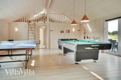 Ud over de mange timer, man kan bruge i husets pool-afdeling, så byder luksushus 194 også på billard/bordtennis og dart