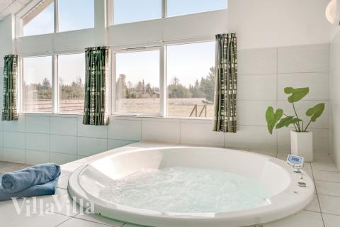 Nyd varmen i spaen i luksushus nr. 304 i Nordjylland