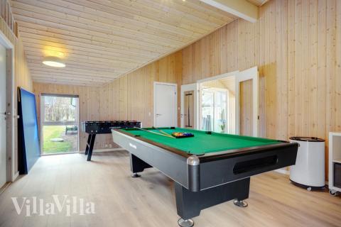 Aktivitetsrum i luksushus nr. 264 med 5 soveværelser og plads til 14 personer.