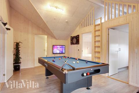 I aktivitetsrummet kan både familie og venner udfordres til en dyst i billard, bordtennis eller dart