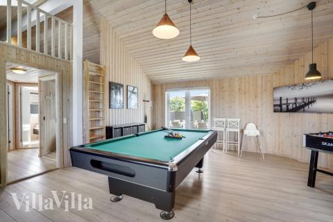 Ud over de mange timer, man kan bruge i husets pool-afdeling, så byder luksushus 246 også på billard/bordtennis og dart
