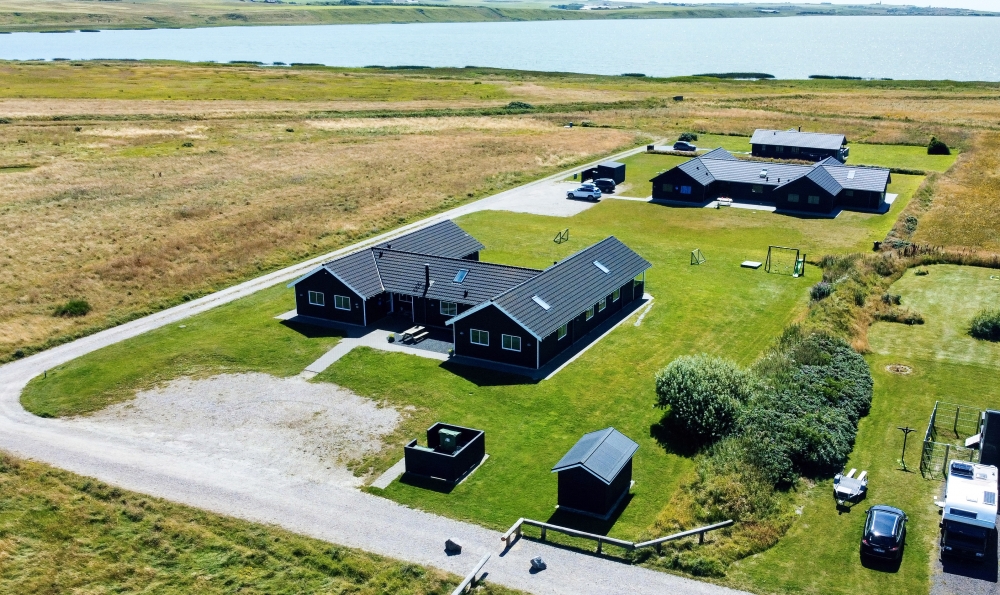 Dette skønne poolhus nr. 293 med plads til 22 personer ligger i Vestjylland