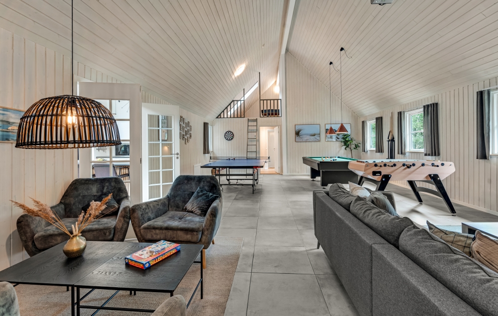 I dette sommerhus kommer man ikke til at kede sig. Der kan dystes med venner og familie i både billard, fodboldspil, airhockey, bordtennis, dart eller Playstation