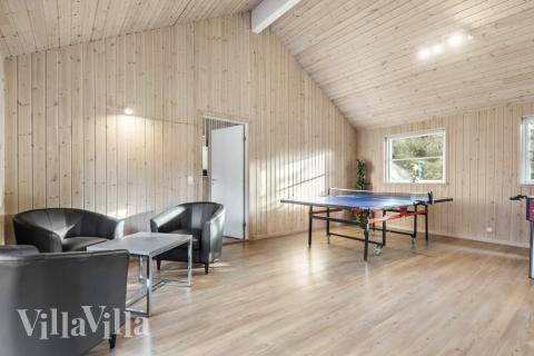 Aktivitetsrum i luksushus nr. 197 med 9 soveværelser og plads til 22 personer.