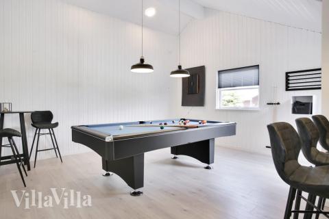 Dyst i sommerhusets aktivitetsrum, når I besøger luksushus nr. 207 i Lolland/Falster/Møn.