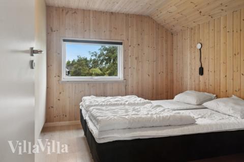 Et af de 5 soveværelser i luksushus nr. 212