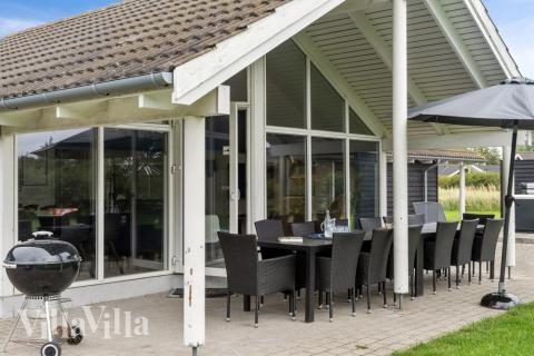 Nyd en grillaften på terrassen i luksushus nr. 212 i Lolland/Falster/Møn