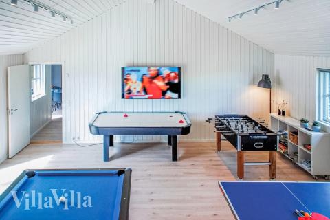 Ud over de mange timer, man kan bruge i husets pool-afdeling, så byder luksushus 201 også på billard/bordtennis og dart