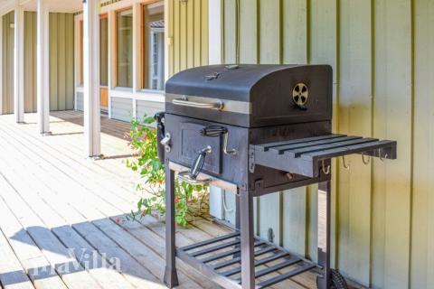 Nyd en grillaften på terrassen i luksushus nr. 126 i Sverige