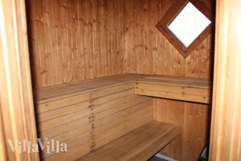 Nyd varmen i saunaen i luksushus nr. 127 til 12 personer