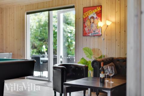 Dyst i sommerhusets aktivitetsrum, når I besøger luksushus nr. 277 i Nordsjælland.