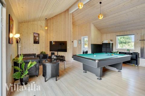Ud over de mange timer, man kan bruge i husets pool-afdeling, så byder luksushus 277 også på billard/bordtennis og dart