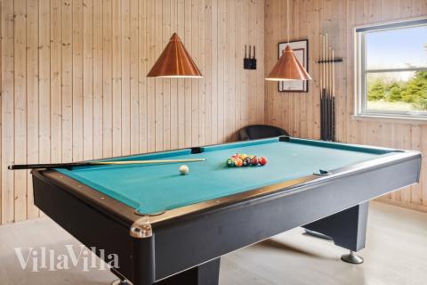 Dyst i sommerhusets aktivitetsrum, når I besøger luksushus nr. 202 i Lolland/Falster/Møn.