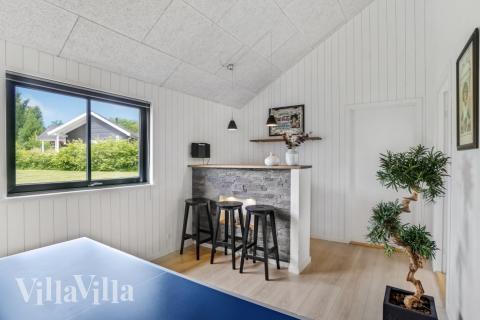 Ud over de mange timer, man kan bruge i husets pool-afdeling, så byder luksushus 276 også på billard/bordtennis og dart