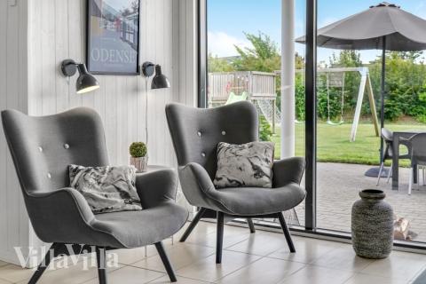 Sofaen i luksushus 276 i Nordsjælland indbyder til brætspil eller at se en film sammen.