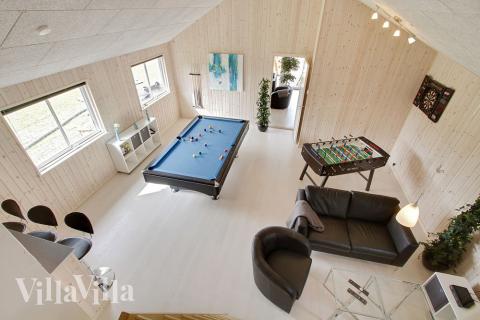 I aktivitetsrummet kan både familie og venner udfordres til en dyst i billard, bordtennis eller dart