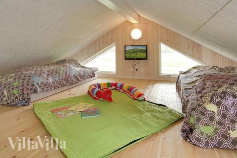 På hemsen er indrettet børne-hjørne