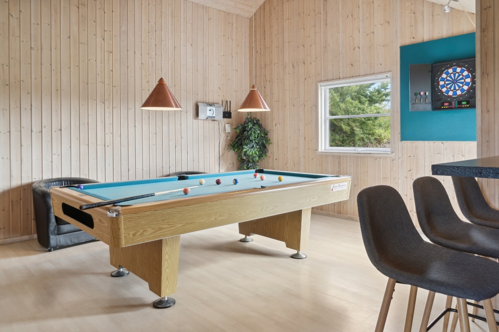 Ud over de mange timer, man kan bruge i husets pool-afdeling, så byder luksushus 208 også på billard/bordtennis og dart