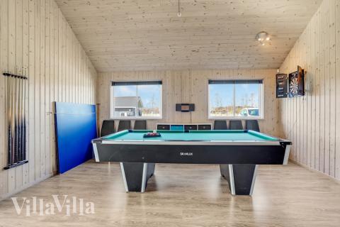 Ud over de mange timer, man kan bruge i husets pool-afdeling, så byder luksushus 299 også på billard/bordtennis og dart