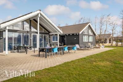 Dette skønne poolhus nr. 299 med plads til 16 personer ligger i Lolland/Falster/Møn
