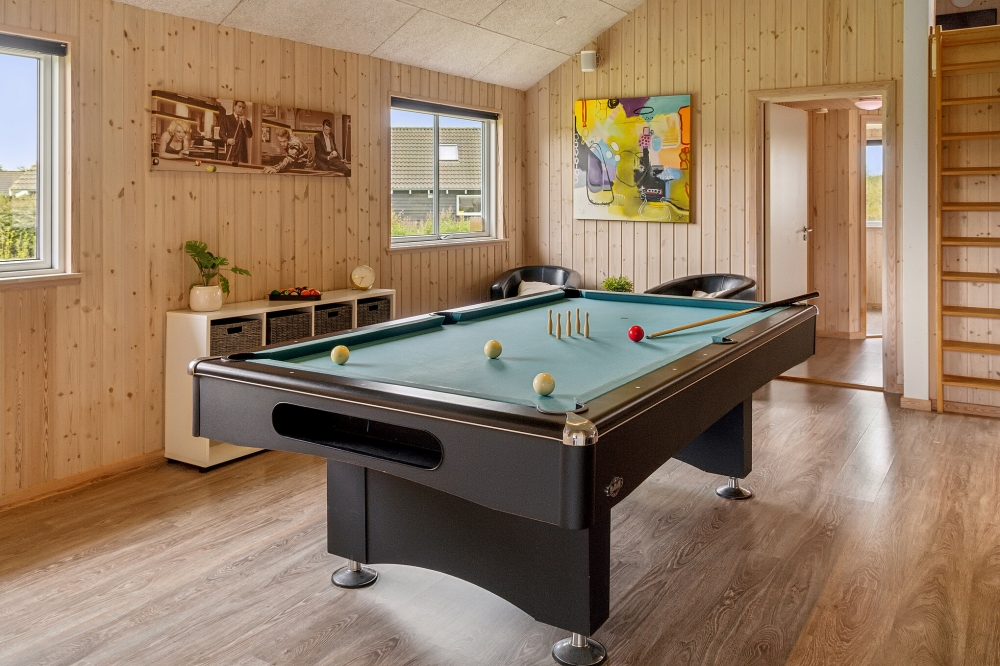Ud over de mange timer, man kan bruge i husets pool-afdeling, så byder luksushus 306 også på billard/bordtennis og dart