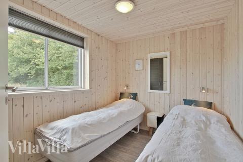 Soveværelserne er velindrettede med enkelt- eller dobbeltsenge og skabe