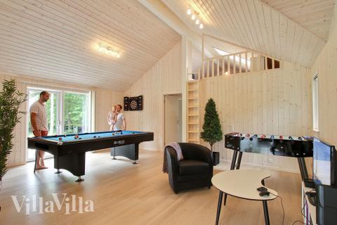 I aktivitetsrummet kan både familie og venner udfordres til en dyst i billard, bordtennis eller dart
