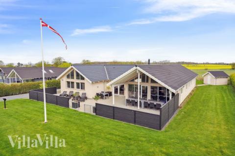 Dette skønne poolhus nr. 315 med plads til 18 personer ligger i Fyn og øer