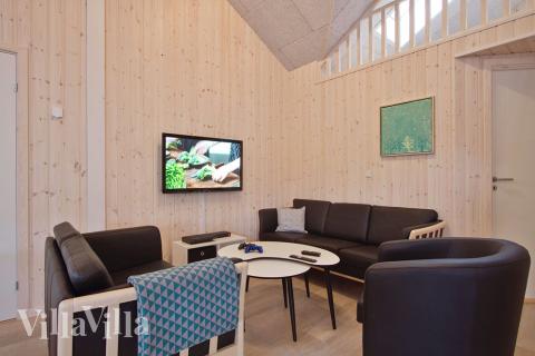 I stuen kan der slappes af med en god film eller bog