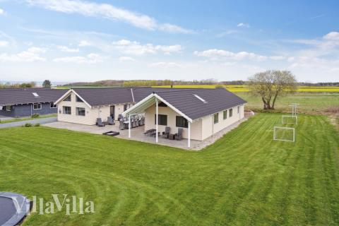 Dette skønne poolhus nr. 318 med plads til 22 personer ligger i Fyn og øer