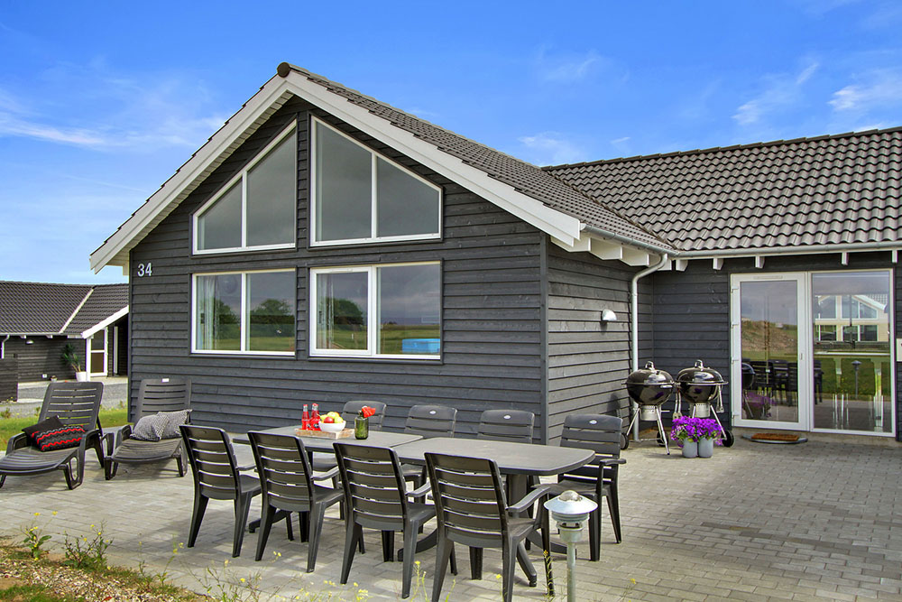 Nyd en grillaften på terrassen i luksushus nr. 319 i Fyn og øer