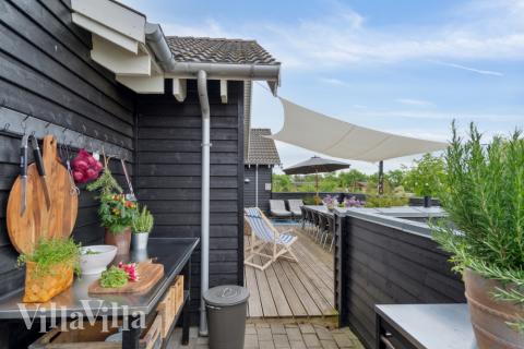 Luksushus nr. 323 har en dejlig terrasse med gode havemøbler til 16 personer.