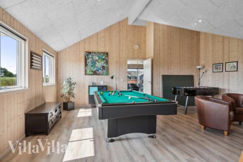 Ud over de mange timer, man kan bruge i husets pool-afdeling, så byder luksushus 324 også på billard/bordtennis og dart