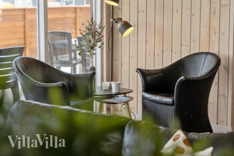 Sofahjørnet i luksushus 324 i Fyn og øer.