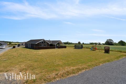 Dette skønne poolhus nr. 324 med plads til 18 personer ligger i Fyn og øer