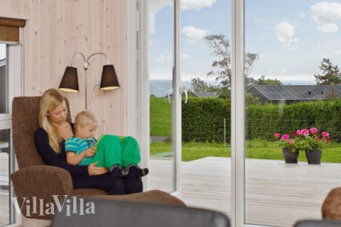 Sofahjørnet i luksushus 327 i Fyn og øer.