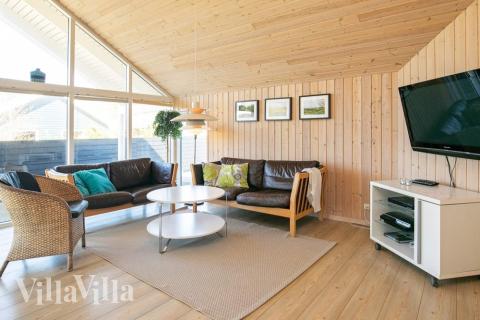 Sofahjørnet i luksushus 326 i Nordjylland.