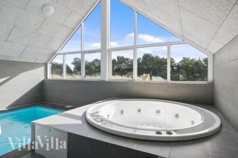 Nyd varmen i spaen i luksushus nr. 332 i Vestjylland