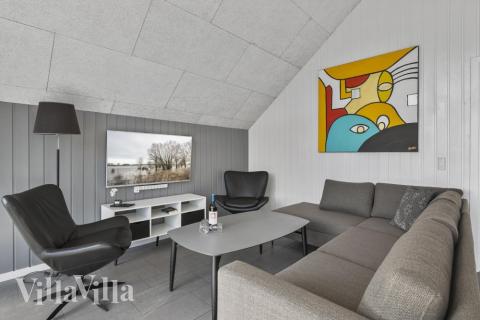 Sofaen i luksushus 332 i Vestjylland indbyder til brætspil eller at se en film sammen.