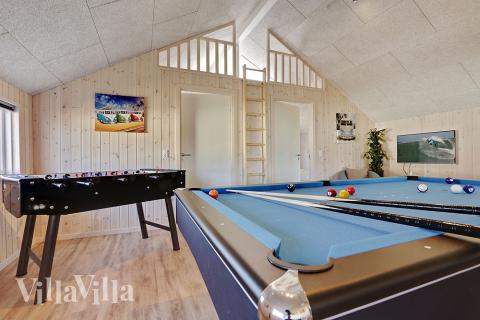 Aktivitetsrum i luksushus nr. 336 med 5 soveværelser og plads til 14 personer.