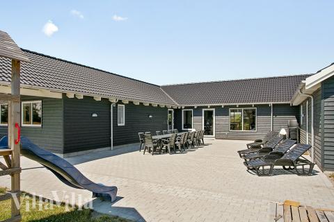 Nyd en grillaften på terrassen i luksushus nr. 343 i Lolland/Falster/Møn