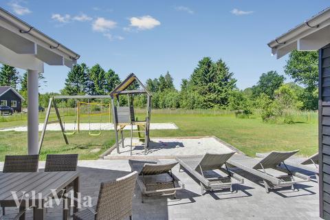 Nyd en grillaften på terrassen i luksushus nr. 358 i Østjylland