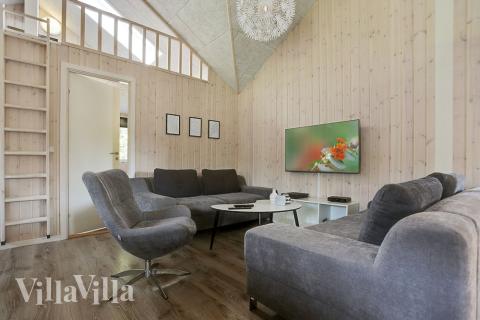 Dyst i sommerhusets aktivitetsrum, når I besøger luksushus nr. 369 i Nordsjælland.