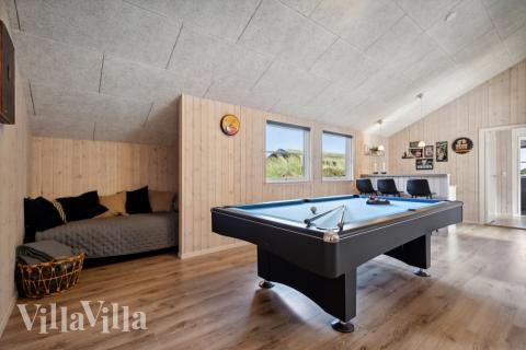 Luksushus 371 til 21 personer byder på et stort aktivitetsrum med bl.a. billard og dart